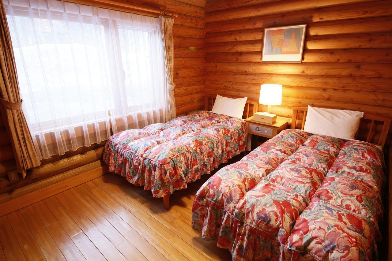 Log Hotel Larch Lake Kanayama Minamifurano Zimmer foto